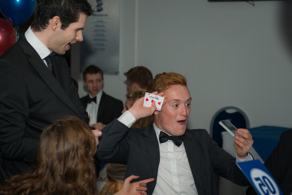 birmingham close up magician performing at a black tie event